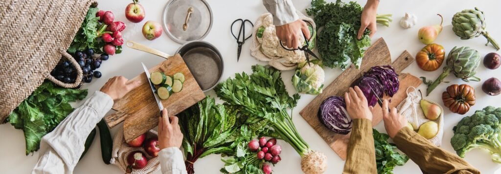 Fall vegetable vegetarian cooking background with greens and fruits