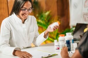 Functional Medicine Female Practitioner Recommending Dietary Supplement to a Client