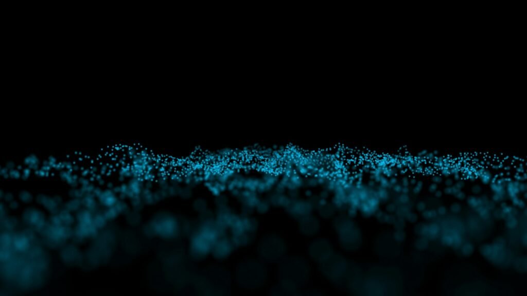 Futuristic background of points and lines with a dynamic wave.