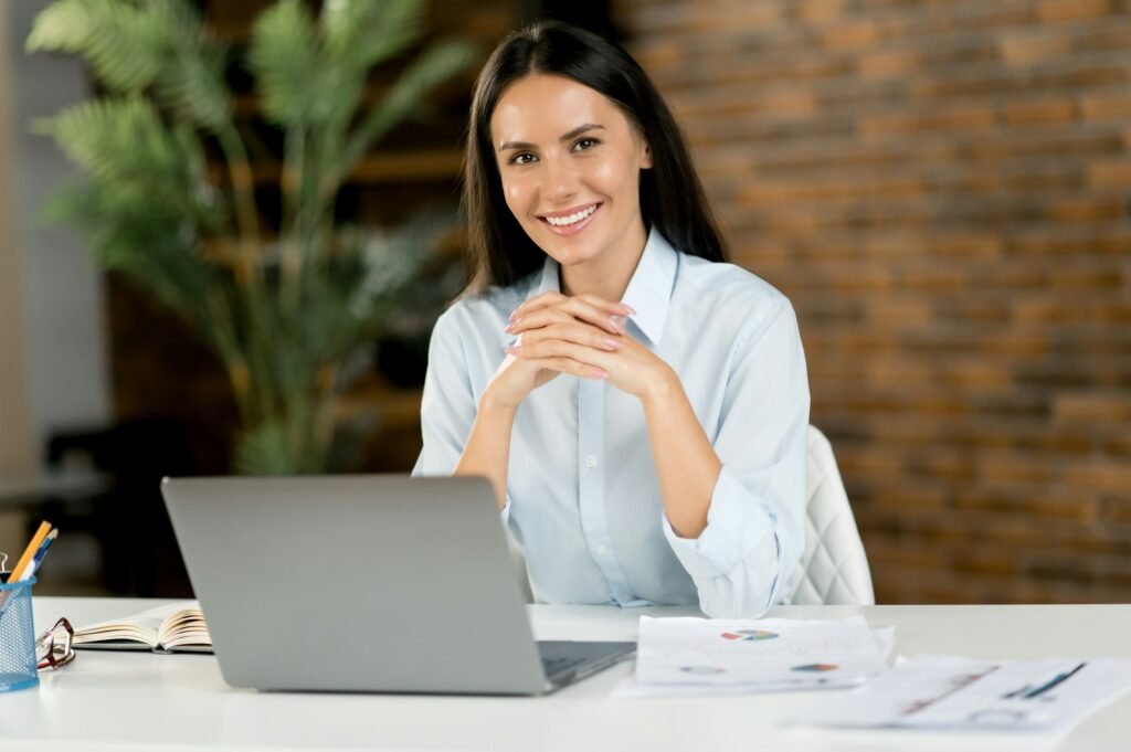 Portrait of a pretty caucasian brunette woman. Successful female office worker, top manager