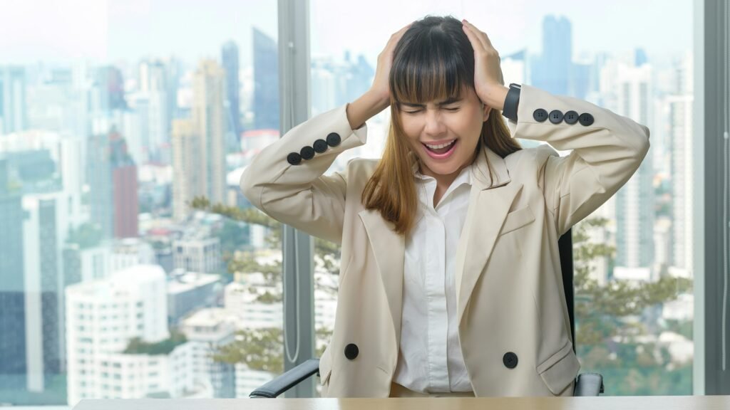 Young business Woman stressed and tired in modern office
